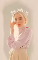 a blonde woman is wearing a pink top