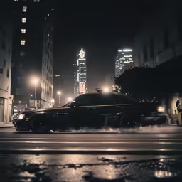 a car driving through a city at night