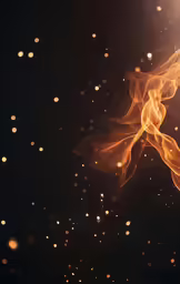 fire flying into the air over dark background