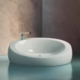 a very modern sink sitting on a counter