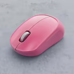 a pink mouse is shown on a gray surface