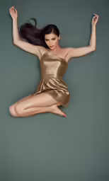 a beautiful woman with long hair flying in the air