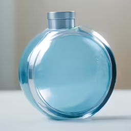 the round blue object is empty on the table