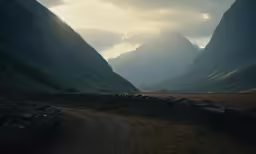 a road going through an area with mountains in the background