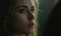 this is an image of a female looking at something