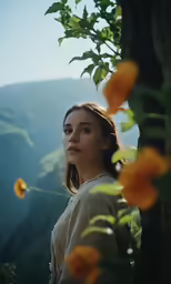 a woman with long hair looking out into the distance