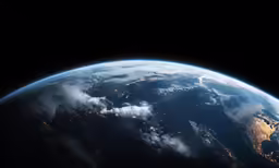 a view of the earth with the light of city lights seen from space