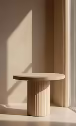 the table is standing in front of a window