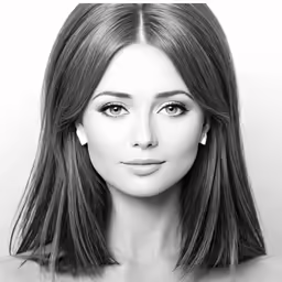 the woman with long hair is posing for the camera
