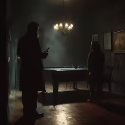 two people are playing pool in a dimly lit room