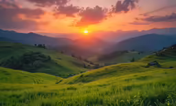 the sun is rising on top of a green hilly area