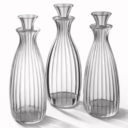 three glass vases sit in a row