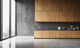 a kitchen that has a sink and counter top