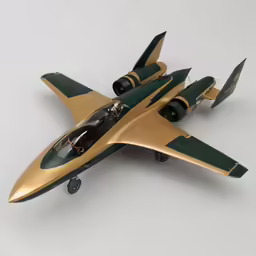 a gold and green model jet on a white background