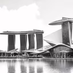 buildings are near the water in a large body of water