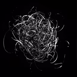 white pieces of string sitting on top of each other