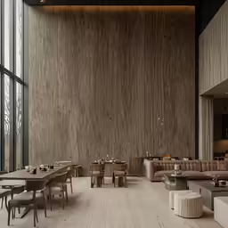 the tables and couches of a restaurant are set up