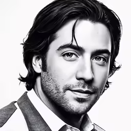 the man in black and white is posing for a photo