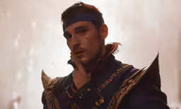 a man with horns and a head band