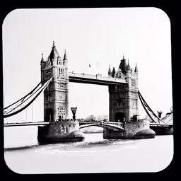 a long black and white photo of a tower bridge