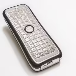 a cell phone with silver embossed on it