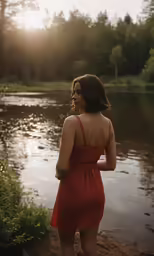 a woman in a red dress walks away from the camera