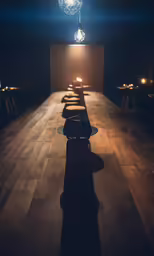 several light bulbs are shining down on the floor