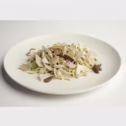 pasta tossed together on white plate displayed in top - to - bottom image