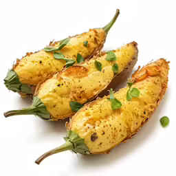 the sweet potatoes have green leaves on top of them