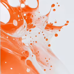 water in orange and white and a splash of liquid