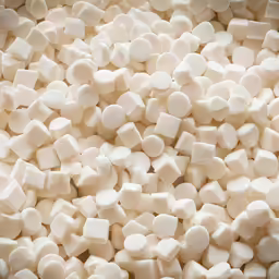small sugar coated marshmallows piled up in a bowl