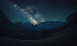 the milky lights over the mountains at night