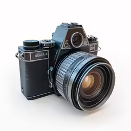 a camera with its lens open sitting on a white surface