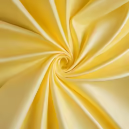 a yellow background of silky fabric