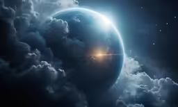 the sun shining through clouds that surround the earth