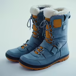 a pair of blue snow boots are shown on a white surface