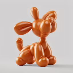 an orange balloon dog sitting in front of a gray background