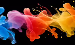 abstract colored smokes against a black background