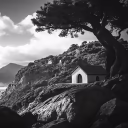 the small chapel sits at the top of a mountain