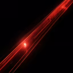 the lights are red and white over the roadway