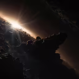 the sun shining above earth seen from space