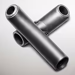 two silver objects with different sizes and shapes