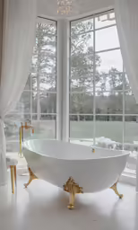 an elegant, large tub and shower in a luxurious bathroom