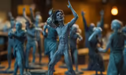 statue of many people with their arms up