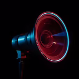 a black wall with a red and blue light on it