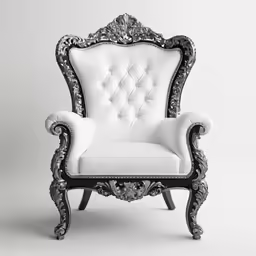 a white and black chair with ornate carvings
