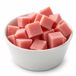 chunks of diced pink melon in a bowl