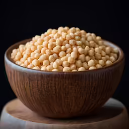 the bowl has chickpeas inside it