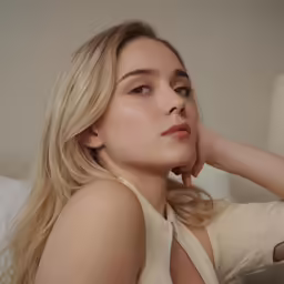 a young woman is relaxing on the bed