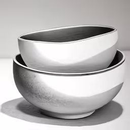 black and white bowl set in three bowls
